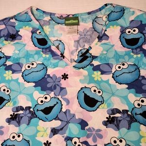 Sesame Street Cookie Monster Scrub Top Womens XL Blue Pink Floral Pockets